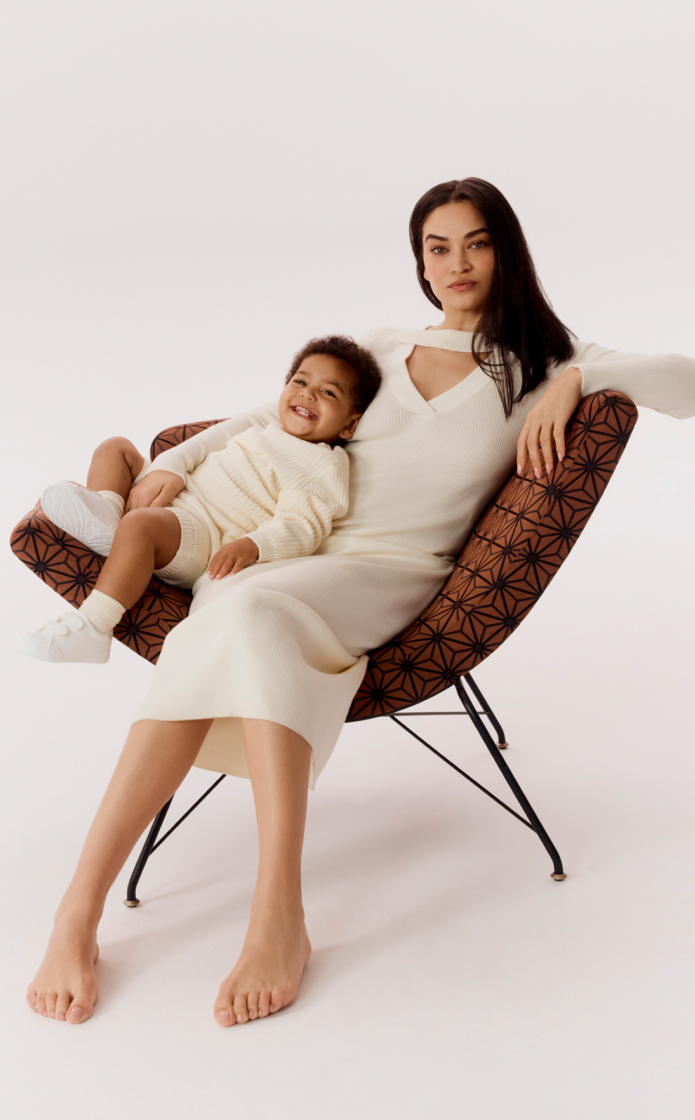 Shanina in the cream knit v neck cut out dress