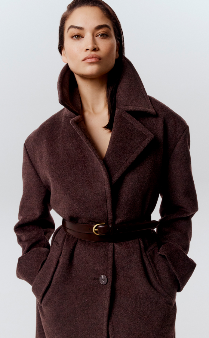 Shanina in raisin wool cashmere lapel coat and syrup brown double wrap belt