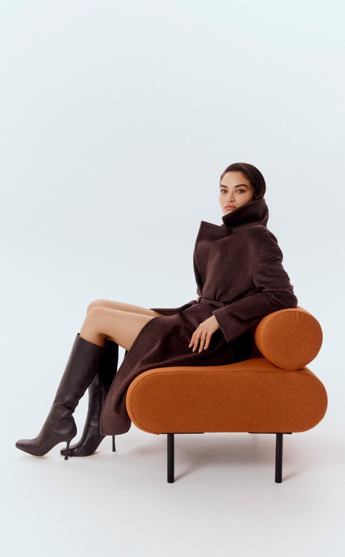 Shanina in raisin wool cashmere lapel coat and syrup brown double wrap belt