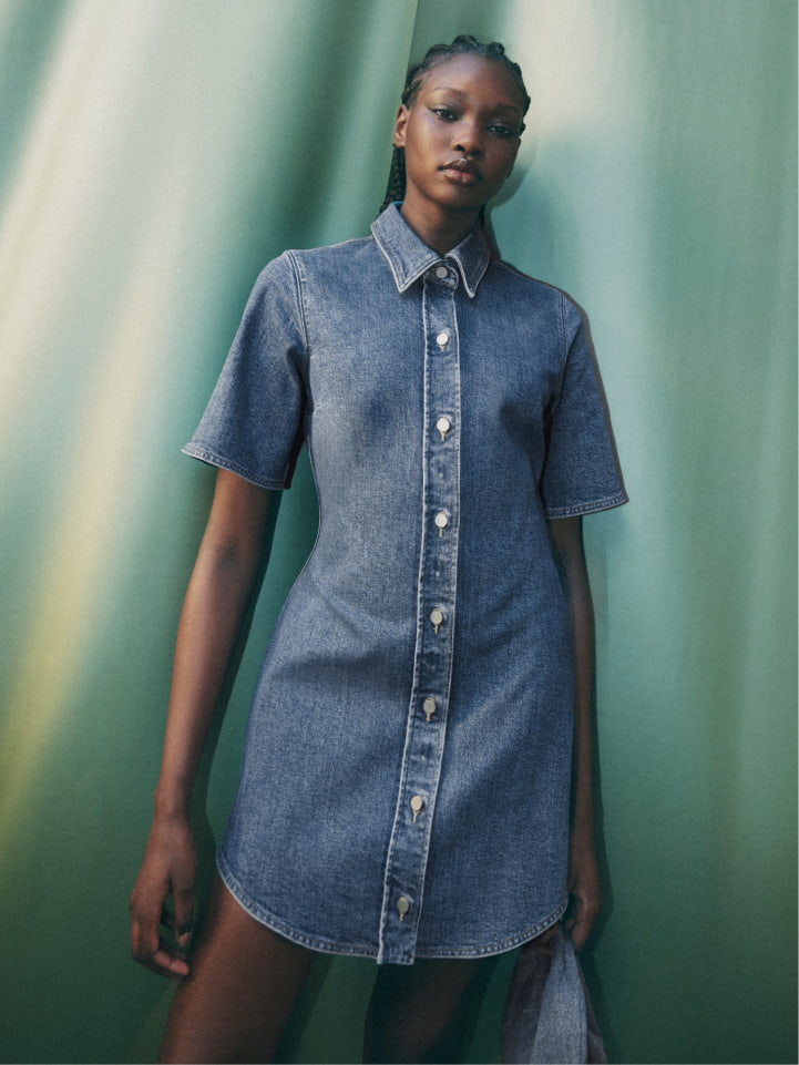 Woman wearing the indigo denim shirt dress