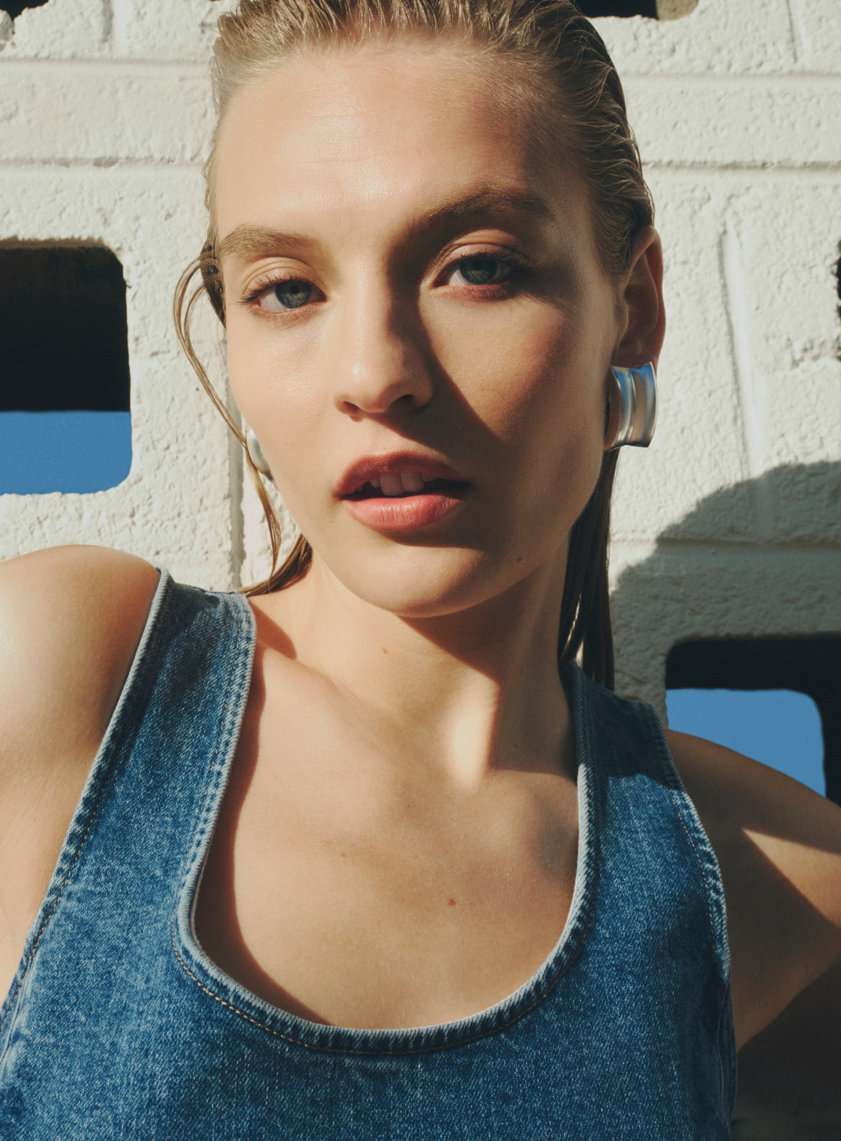 Woman in denim mini dress