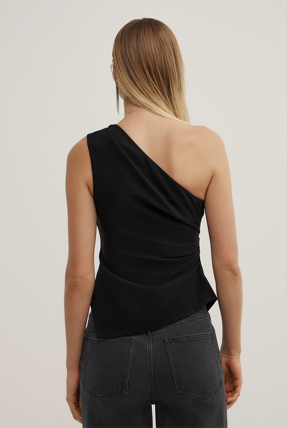 Asymmetric Structured Top